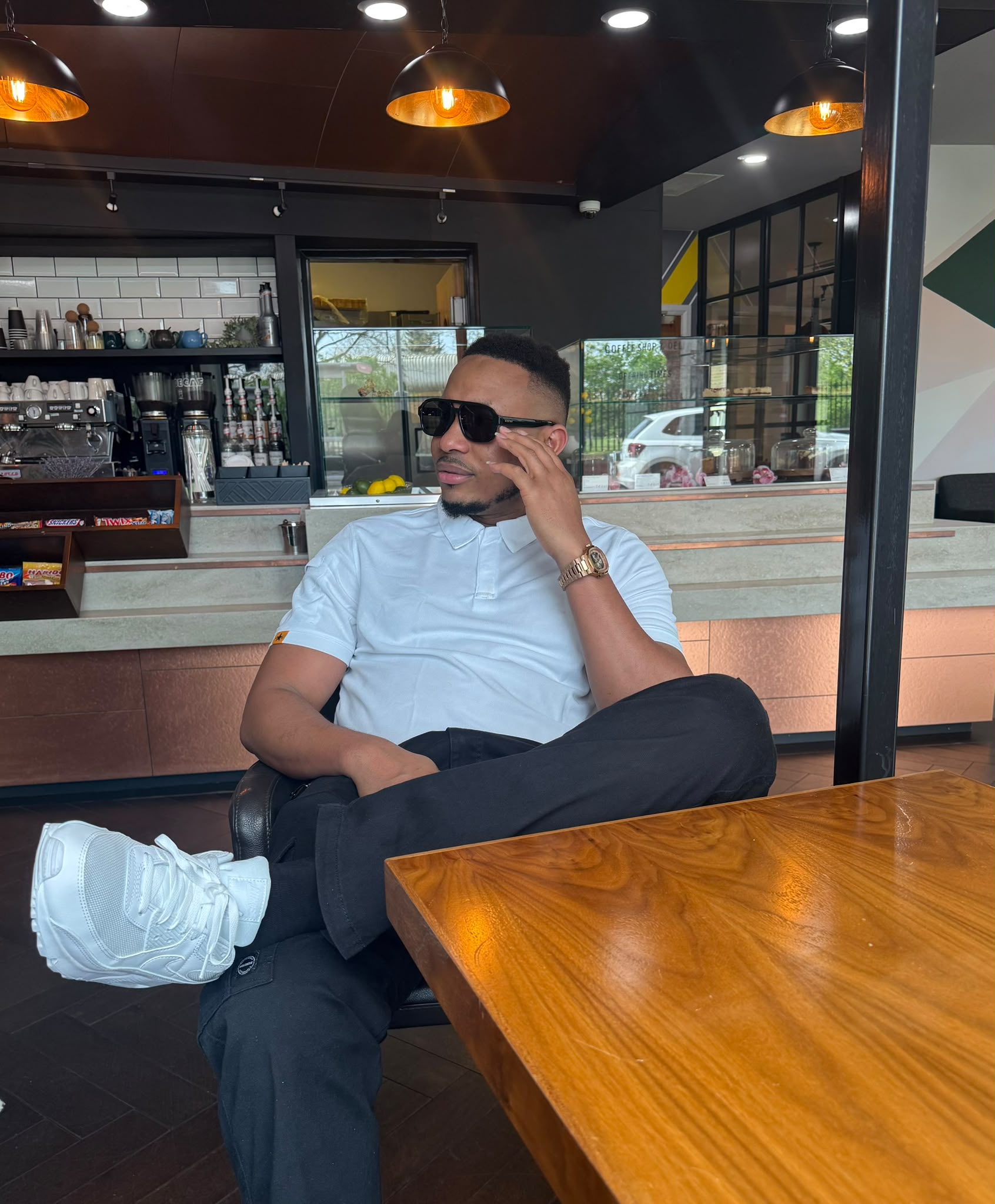 Sir KennyBless at coffee shop