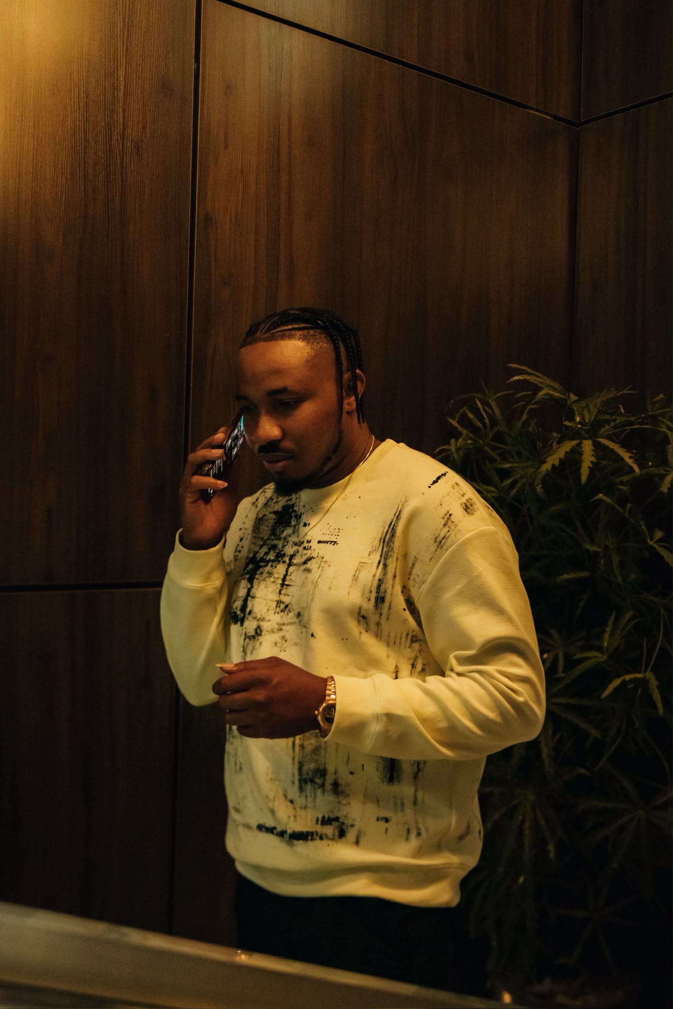 Sir KennyBless on the phone